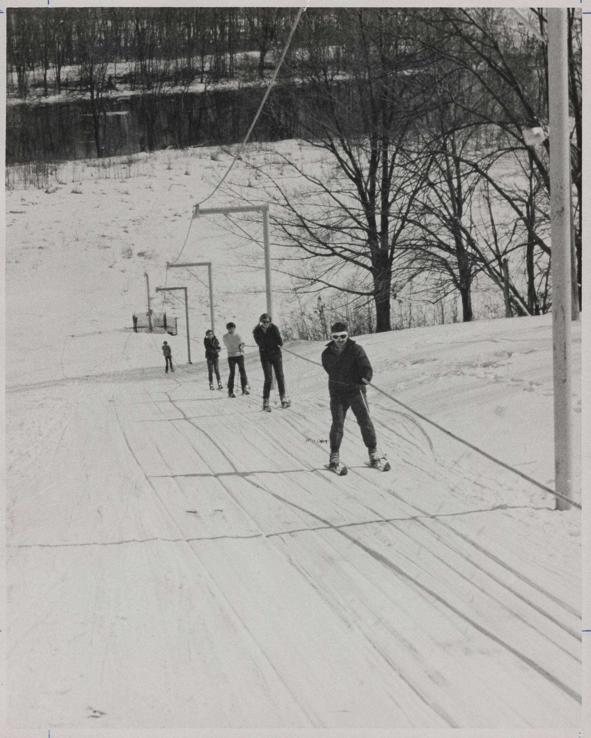Students going up the toe rope